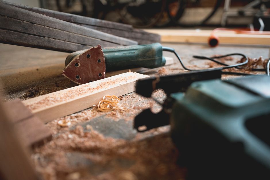 Woodworking tools on a workbench for custom cabinets